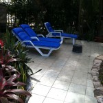 Patio furniture by the pool around the gated complex in playa del carmen