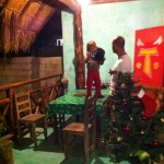 Sergio entertaining the little boy in playa home of gaston