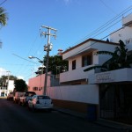 Side Street In Mexico shows a house complex