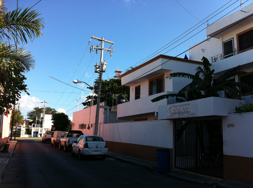 Side Street In Mexico shows a house complex