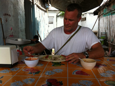 Jimmy From Casa De Las Olas enjoying some tacos in a Tulum restaurant2