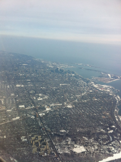 Sky view from air delta airlines over the city of toronto ontario in canada